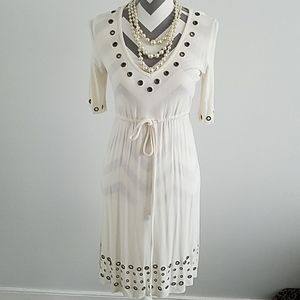 Off-white dress with copper studded accent